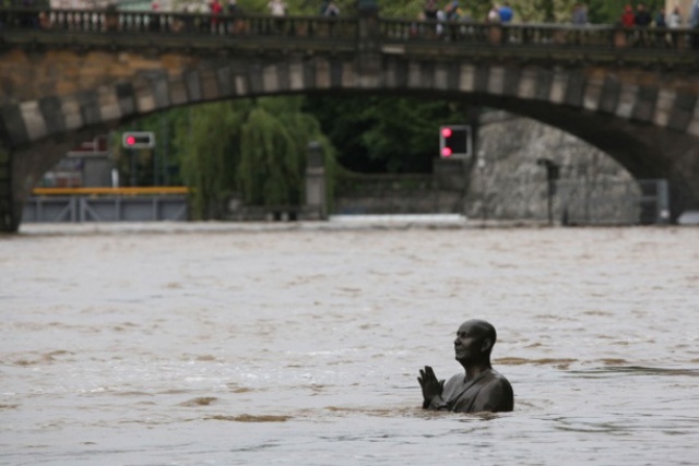 Statue of Indian spiritual leader Sri Chinmoy. Flood in Prague, Czech Republic, on June 2, 2013.