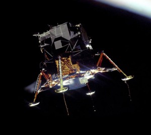 Apollo_11_Lunar_Module_Eagle_in_landing_configuration_in_lunar_orbit_from_the_Command_and_Service_Module_Columbia