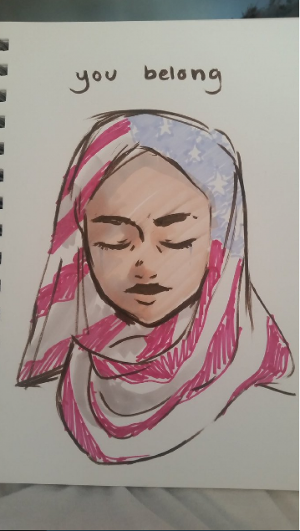 Hidžáb v barvách americké vlajky a nápis „Patříš“.